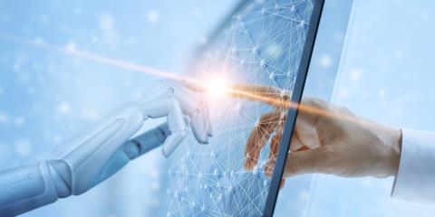Hands of robot and human touching on virtual interface
